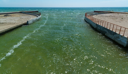 UKRAINE, KOBLEVO - MAY 01, 2021: Hydraulic structure, artificial canal in Tiligul estuary, southern Ukraineのeditorial素材