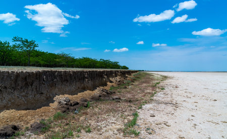 The steep shore of a dry salt lake near the Tuzla estuaryの写真素材