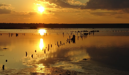 Red-yellow sunset over the Kuyalnitsky estuary, southern Ukraine