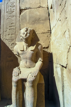 Luxor, Egypt - November  10, 2004: Seated statue of Pharaoh Thutmose III at Karnak in Luxor, Egypt
