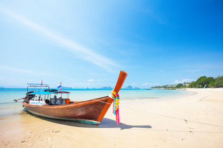 Long tail boat on tropical beach, Krabi, Thailandのeditorial素材