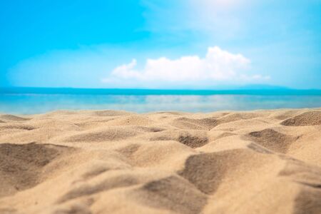 Blur defocused background of tropical beach and blue sea and sky with white cloudの写真素材