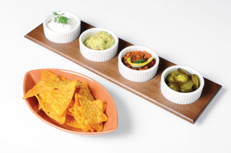 Mexican tortilla chips with dipping sauces