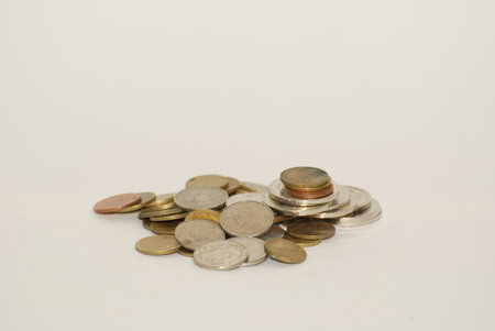 Golden coins isolated on white background