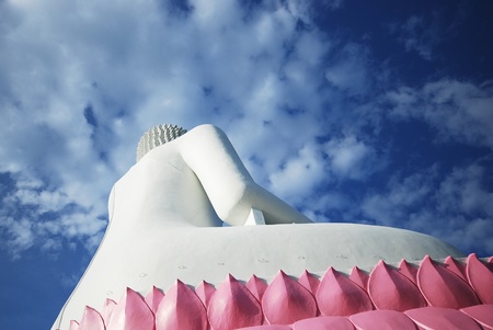 Back white buddha on the blue skyの写真素材