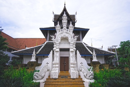 Thai art detail on top of temple doorの写真素材
