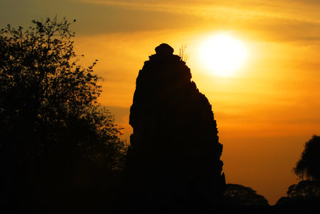 The silhouettes of stupas temple in Thailandの写真素材