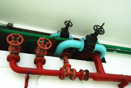 The pipes and valves water on the wall のeditorial素材