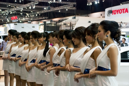 BANGKOK, THAILAND - DECEMBER 4  Unidentified female presenter at the booth in THE THAILAND INTERNATIONAL MOTOR EXPO 2009 on December 4, 2009 in Bangkok, Thailand のeditorial素材