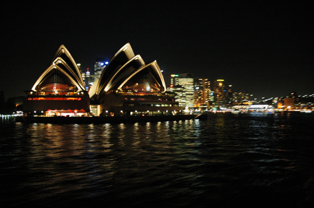 Abstract Stock Photo of Sydney Opera House at Night Sydney from Harbour featuring the city, circular quays, the rocks, ferry, waterfront skyline and Harbour Bridge. Intentional movement in shot to create arty feel.のeditorial素材