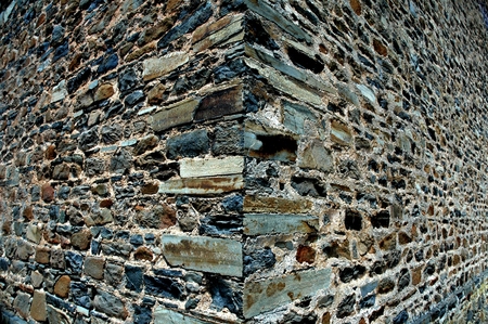 Background Texture with very old stone building and 3d feel of heritage building corner. Good for crossroads, walls, old building or heritage themeの写真素材