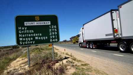 Australian highway freeway road street sign,  Featuring distance, regional towns, speed on the roadside.の写真素材