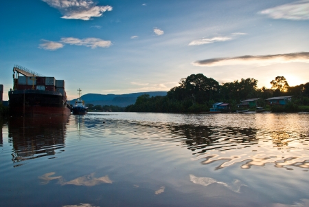 big ship docking on sunriseの写真素材