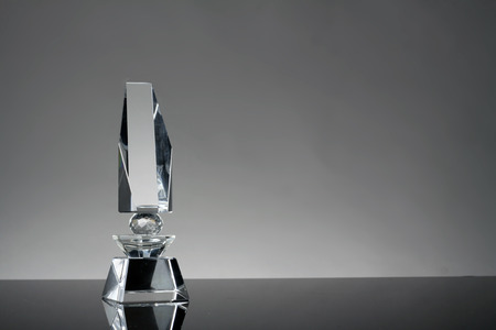 glass trophy in gray backgroundの写真素材