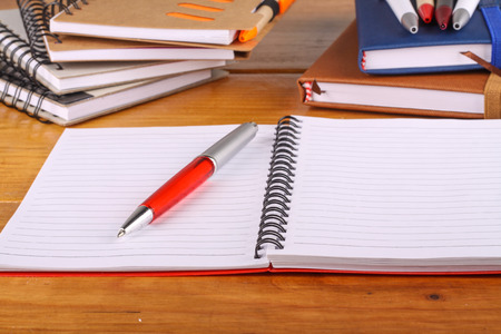 stationaries isolated on wooden backgroundの写真素材