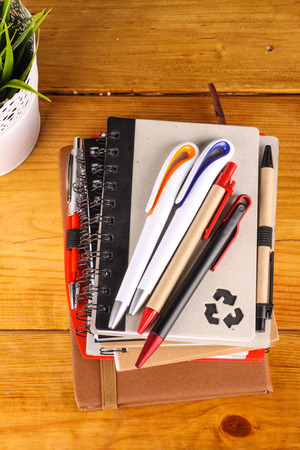 stationaries isolated on wooden backgroundの写真素材
