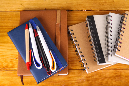 stationaries isolated on wooden backgroundの写真素材