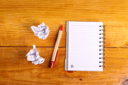 notebook on wood backgroundの写真素材