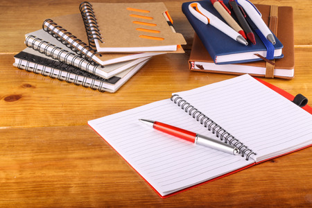 stationaries isolated on wooden backgroundの写真素材