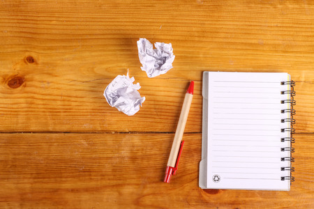 notebook on wood backgroundの写真素材