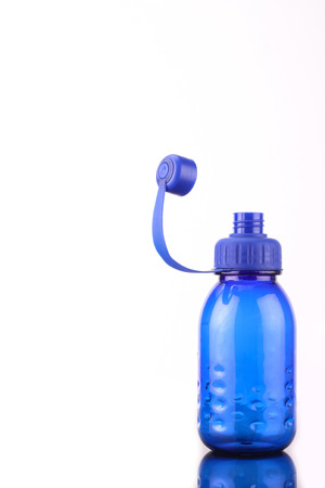 blue bottle isolated on white backgroundの写真素材