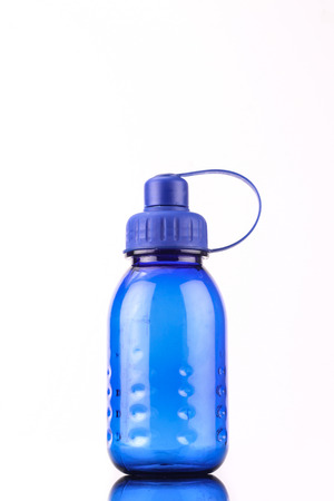 blue bottle isolated on white backgroundの写真素材