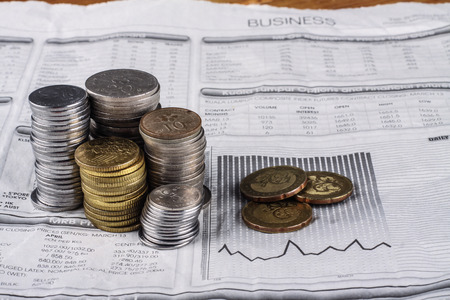 coins on the business diagram. close-upの写真素材