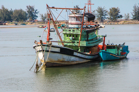 fishing boats on the beach at Kuala Terengganuの写真素材