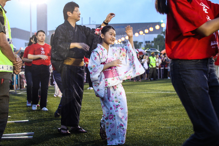 SHAH ALAM, MALAYSIA - SEPTEMBER 5: Bon-Odori Festival in Shah Alah,  on September 5, 2015. Participants in "Bon Odori" festival, held annually to celebrate the unique style of dancing performance from japan to Malaysia.のeditorial素材
