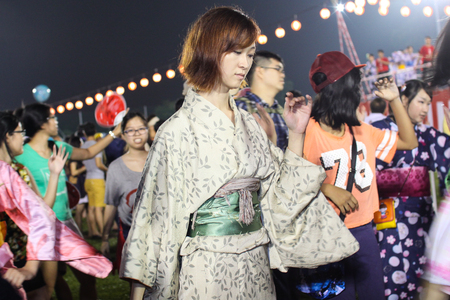 SHAH ALAM, MALAYSIA - SEPTEMBER 5: Bon-Odori Festival in Shah Alah,  on September 5, 2015. Participants in "Bon Odori" festival, held annually to celebrate the unique style of dancing performance from japan to Malaysia.のeditorial素材