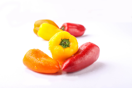three types of pickled pepper isolated on white backgroundの写真素材