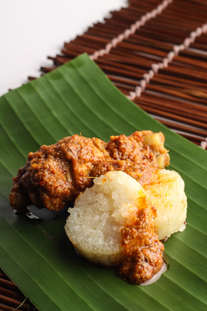malay lemang served with rendang ayamの写真素材