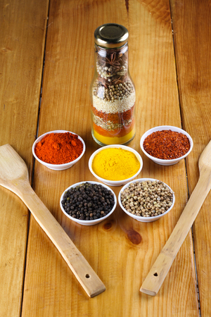mixed spices and herb with wood backgroundの写真素材