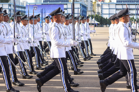 KUALA LUMPUR - NOV 7 : Newly grad Malaysian Cadet Inspector doing a parade run to complete their nine month training on November 7, 2015 at PDRM Training Centre Kuala Lumpur Malaysia.のeditorial素材