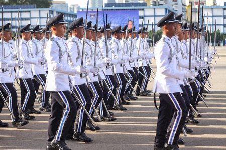 KUALA LUMPUR - NOV 7 : Newly grad Malaysian Cadet Inspector doing a parade run to complete their nine month training on November 7, 2015 at PDRM Training Centre Kuala Lumpur Malaysia.のeditorial素材
