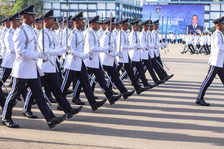 KUALA LUMPUR - NOV 7 : Newly grad Malaysian Cadet Inspector doing a parade run to complete their nine month training on November 7, 2015 at PDRM Training Centre Kuala Lumpur Malaysia.のeditorial素材