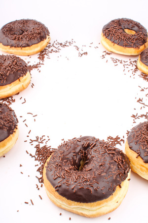 chocholate doughnuts with empty content space in the middleの写真素材