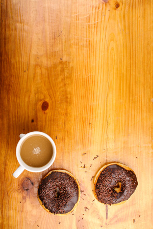 concept of chocholate doughnuts with wood palet backgroundの写真素材