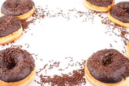 chocolate doughnuts with empty content space in the middleの写真素材
