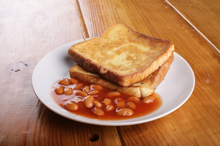 home made toast in wood backgroundの写真素材