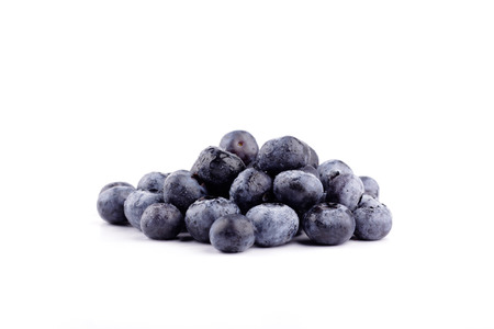 blueberries isolated in white backgroundの写真素材