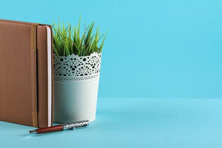 notebook planner in pastel blue backgroundの写真素材