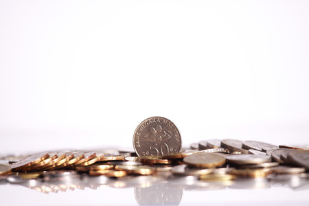 Coins isolated on white backgroundの写真素材