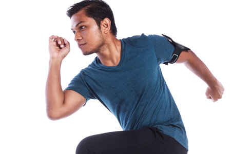 closed up young man sprinting isolated on white background