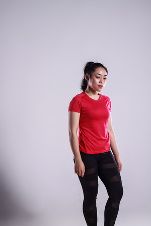 malay teenage woman with sports outfitの写真素材