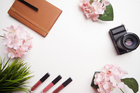 equipment for ladies and camera on table view from topの写真素材