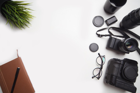camera equipment on top of table with empty space at the middleの写真素材