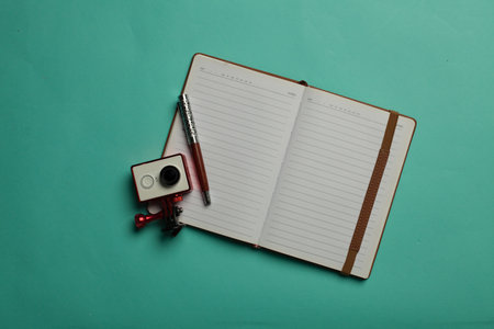 travel flat lay on turquoise background
