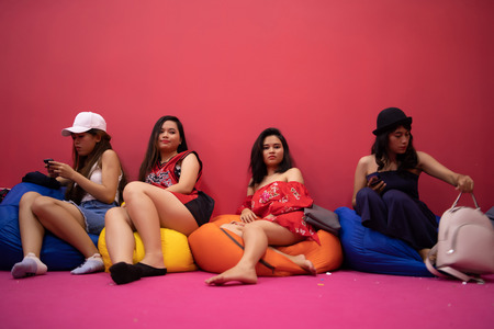 asian teenage girl with smartphoneの写真素材