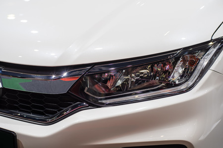 modern car headlamp on white carのeditorial素材